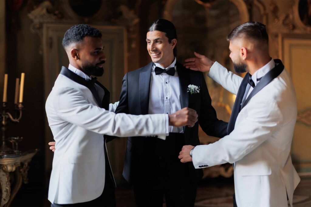 The groom's friends congratulate him on his wedding.