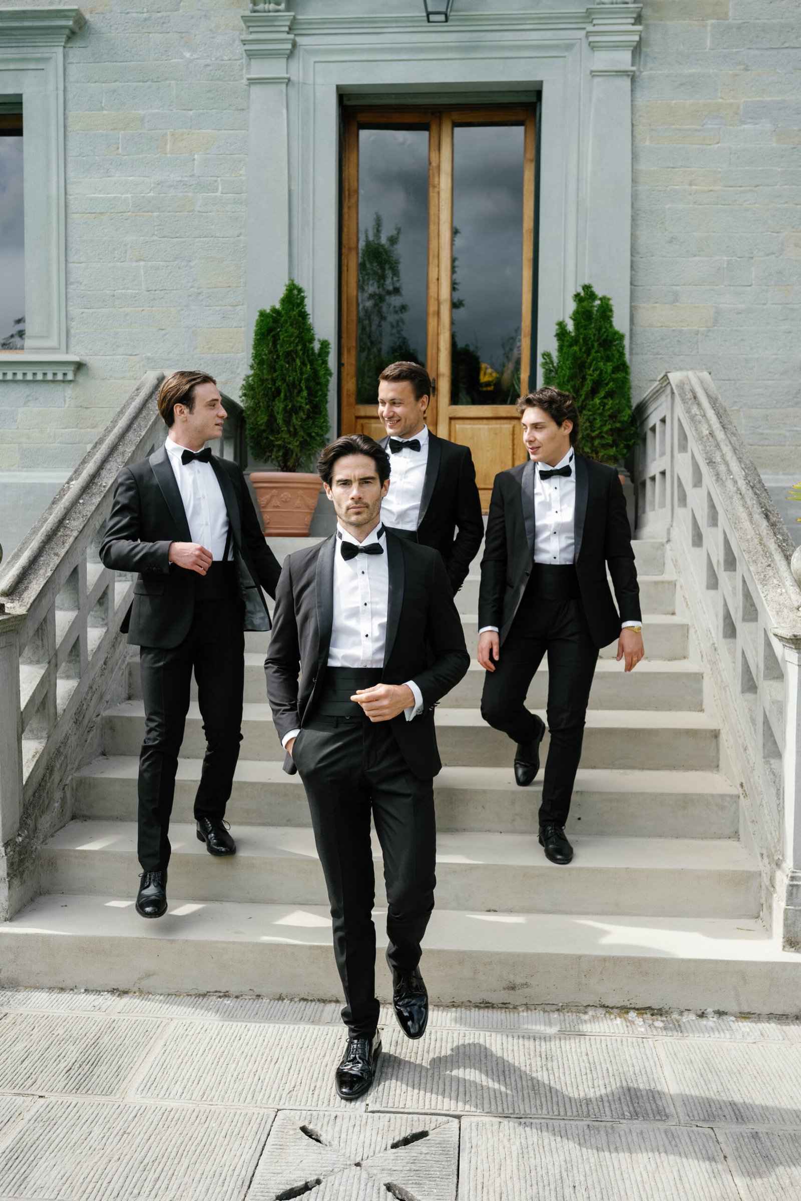 Groomsmen in tuxedos at a luxury venue