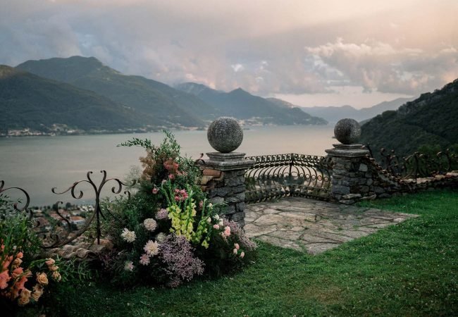 The floral decorations used in the workshop, with Lake Como and mountains in the background